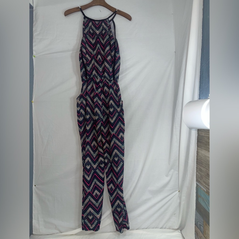 Exhilaration Jumpsuit X-Small with pattern on it not new but in great condition.